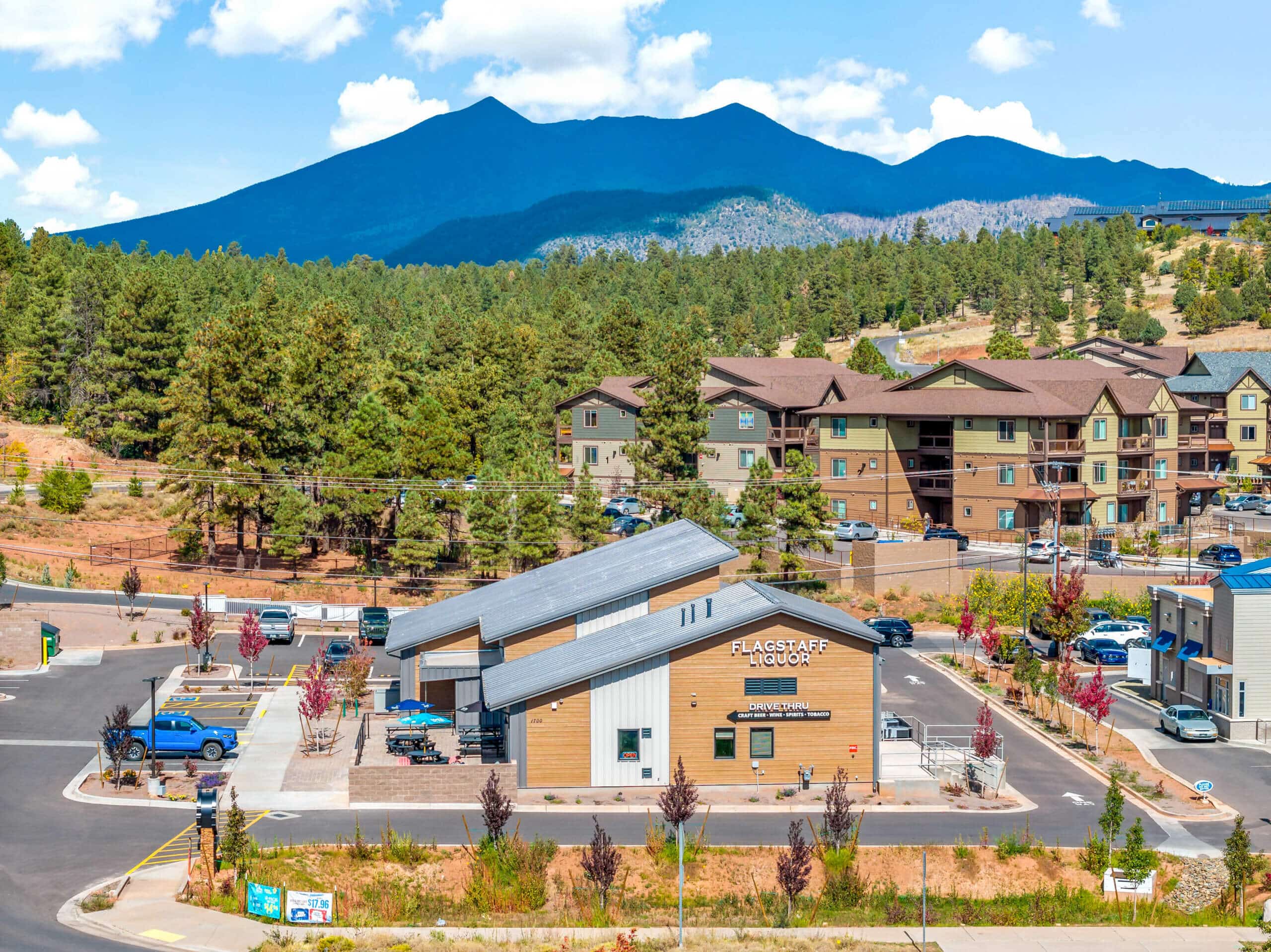 Flagstaff Liquors, a modern drive-thru store offering premium wines, spirits, beers, and cigars in Northern Arizona.