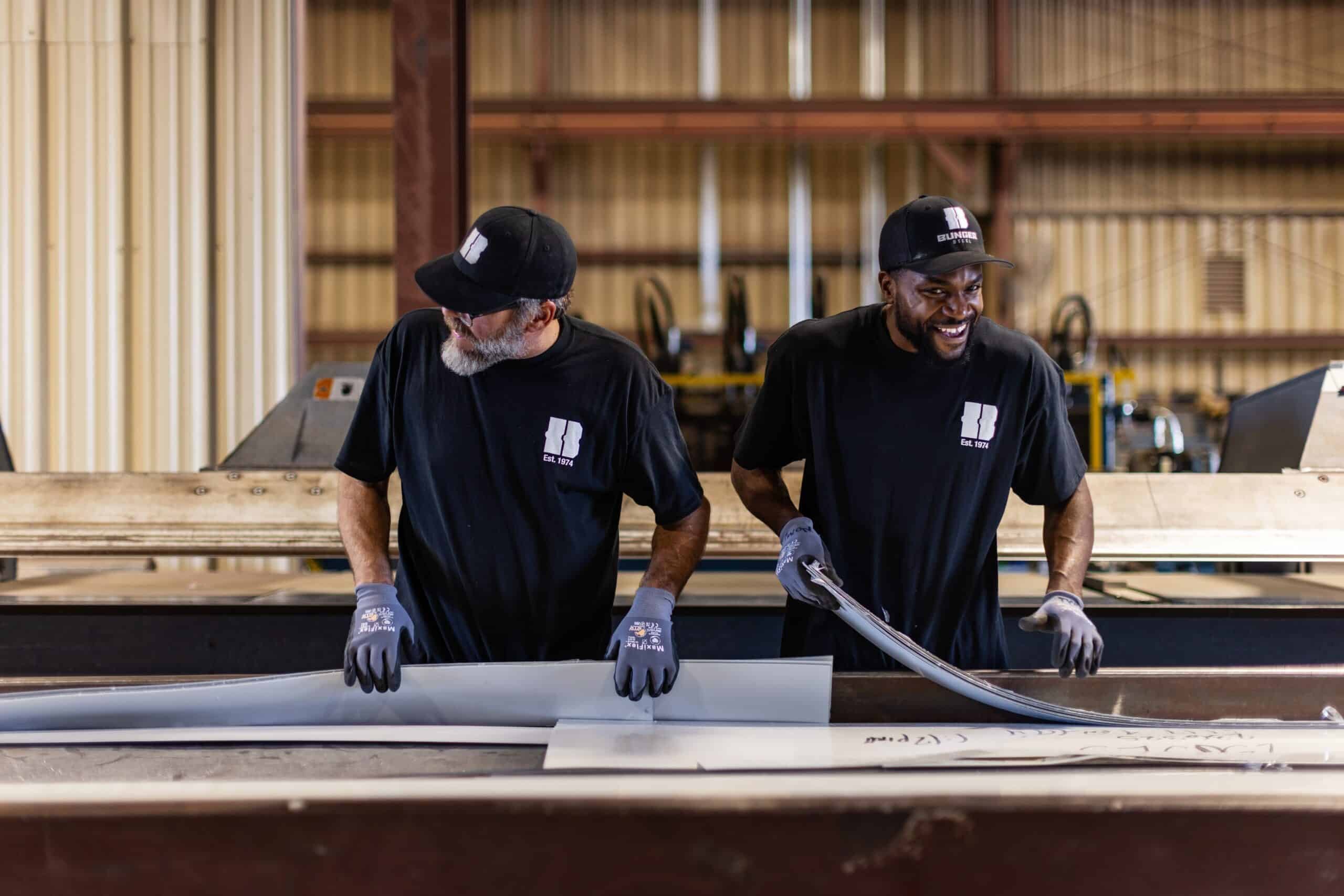 Arizona Breweries & Restaurants 2 Two men working with metal sheets.
